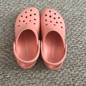 Used pink crocs.